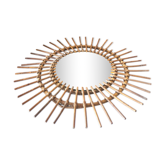 Vintage wicker rattan sun mirror
