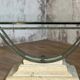 Table basse en verre et métal patine antique