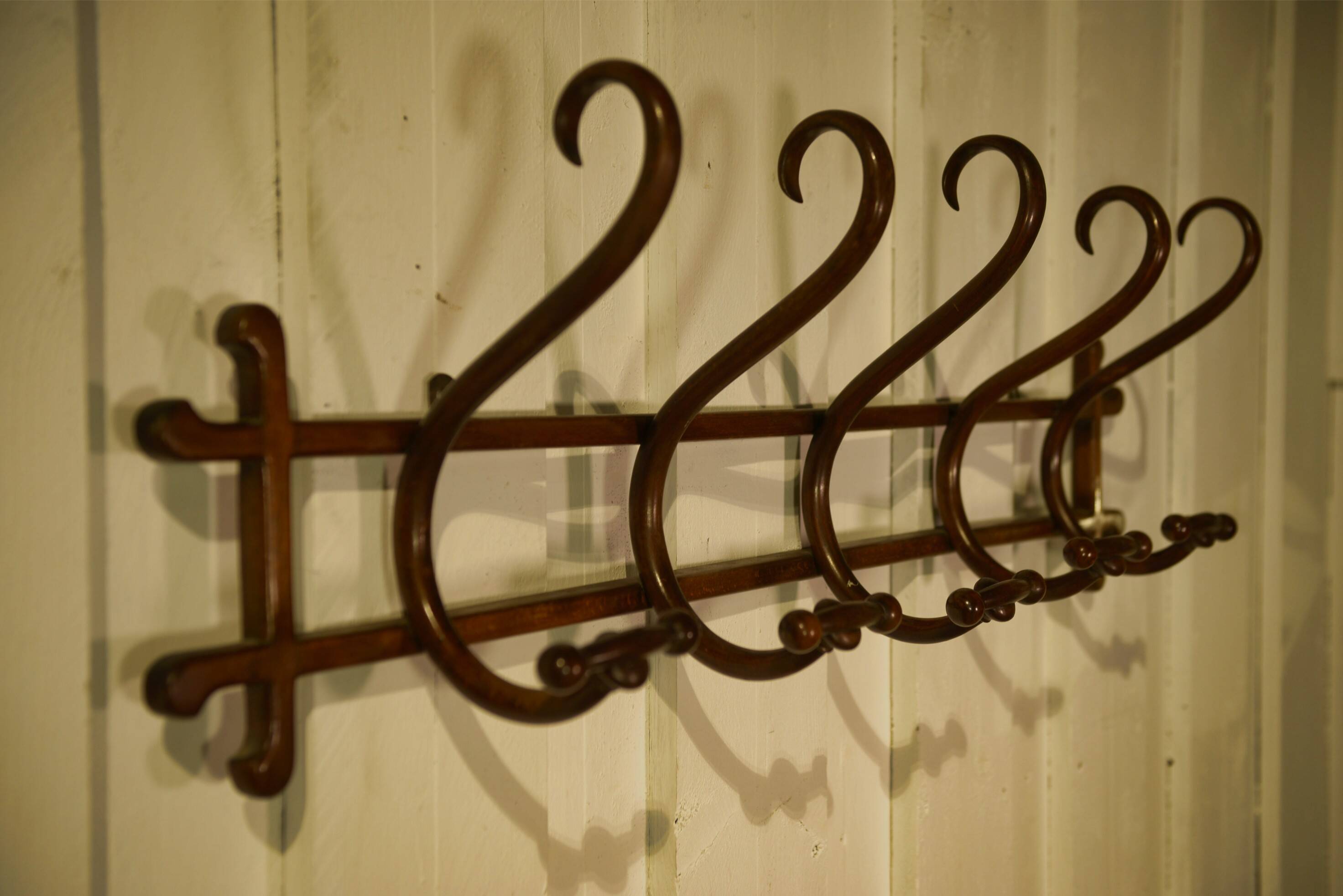Curved beech wall coat rack published by Thonet, 1930s.