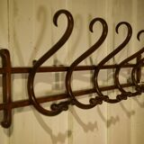 Curved beech wall coat rack published by Thonet, 1930s.