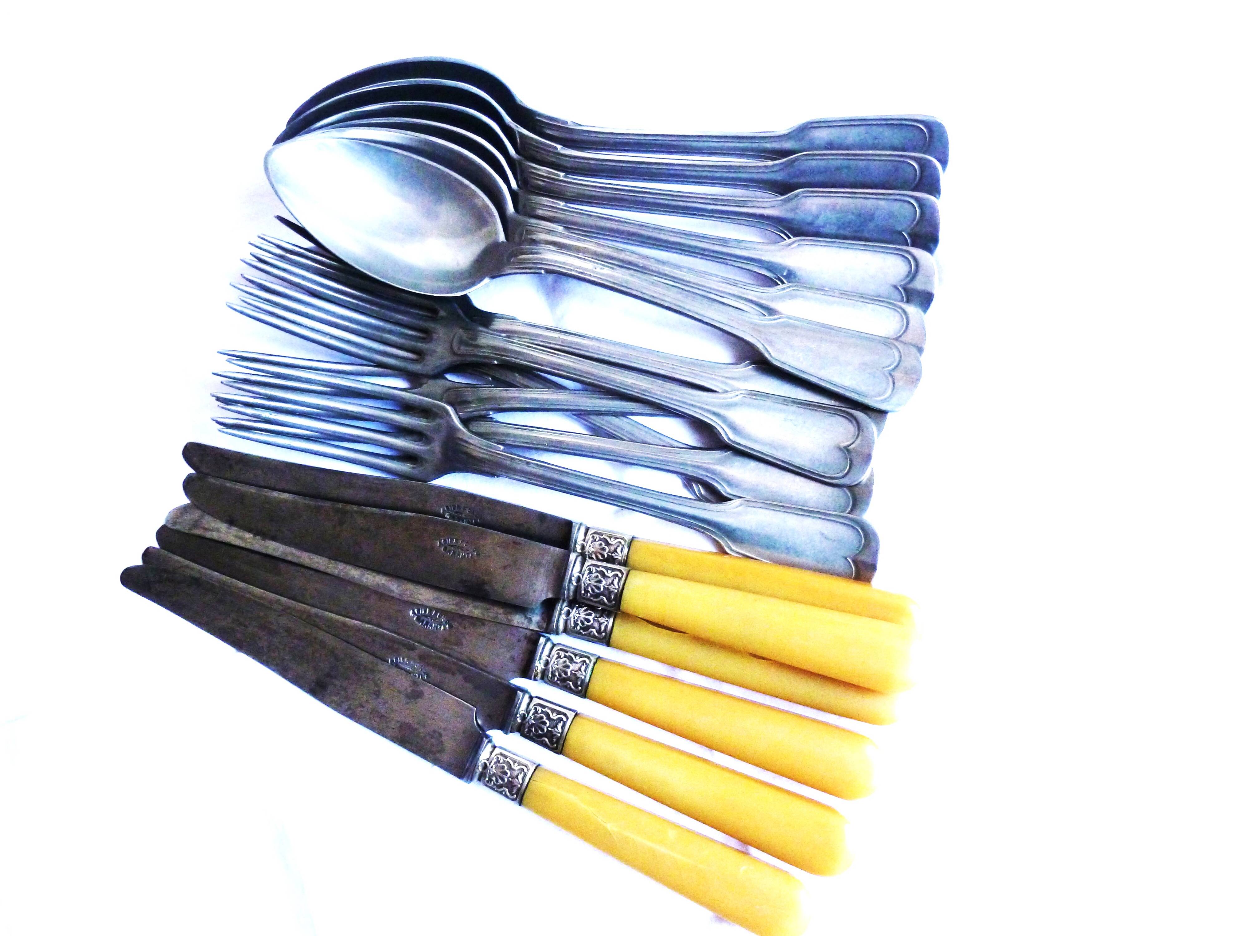 Art Deco cutlery, spoons, forks and table knives.