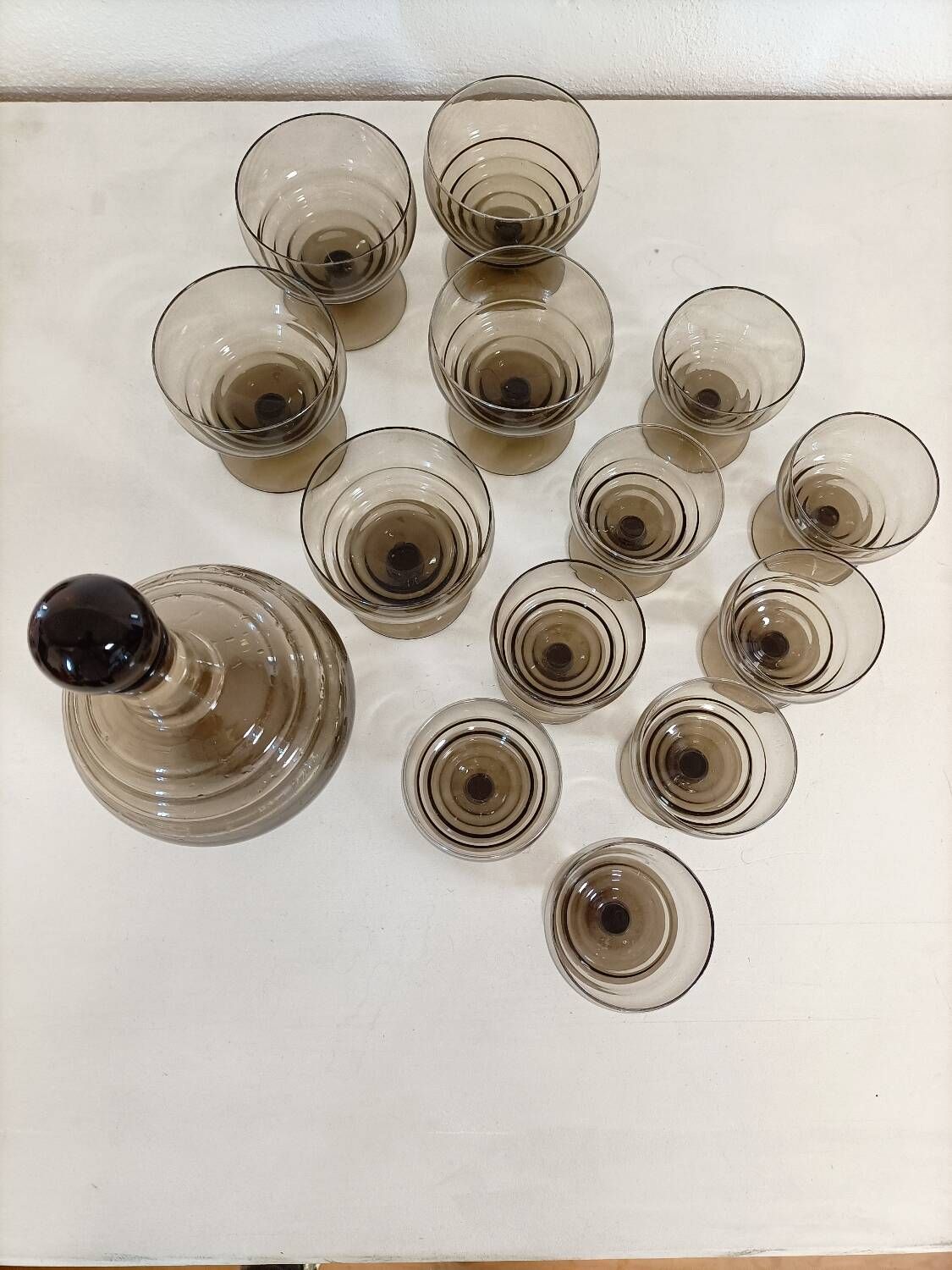 Smoked glass glasses and carafe from the 60s and 70s