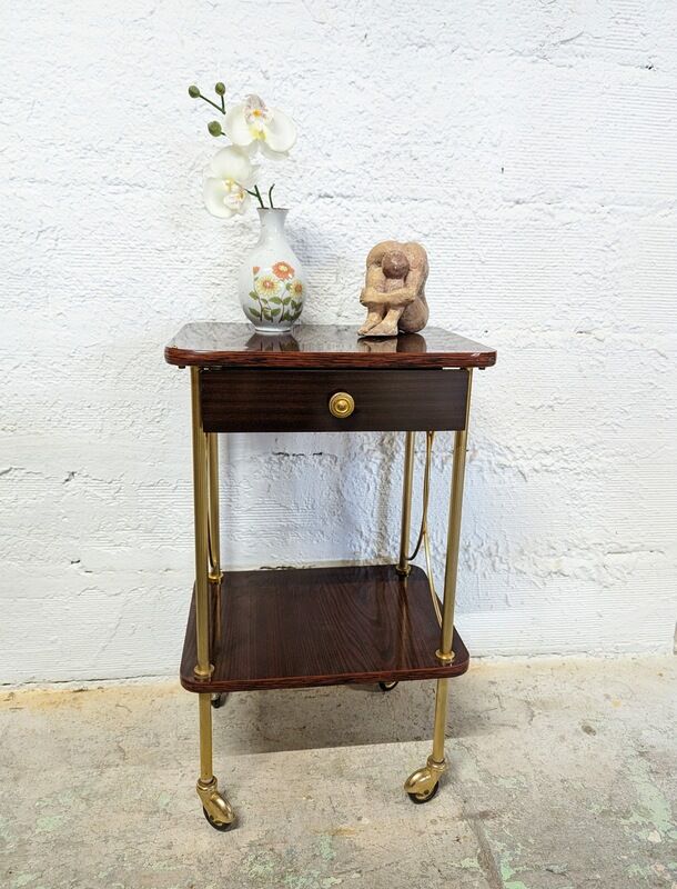Vintage bedside table with wheels