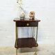 Vintage bedside table with wheels