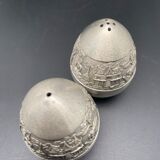 Egg-shaped metal salt and pepper shakers with Asian countryside motif