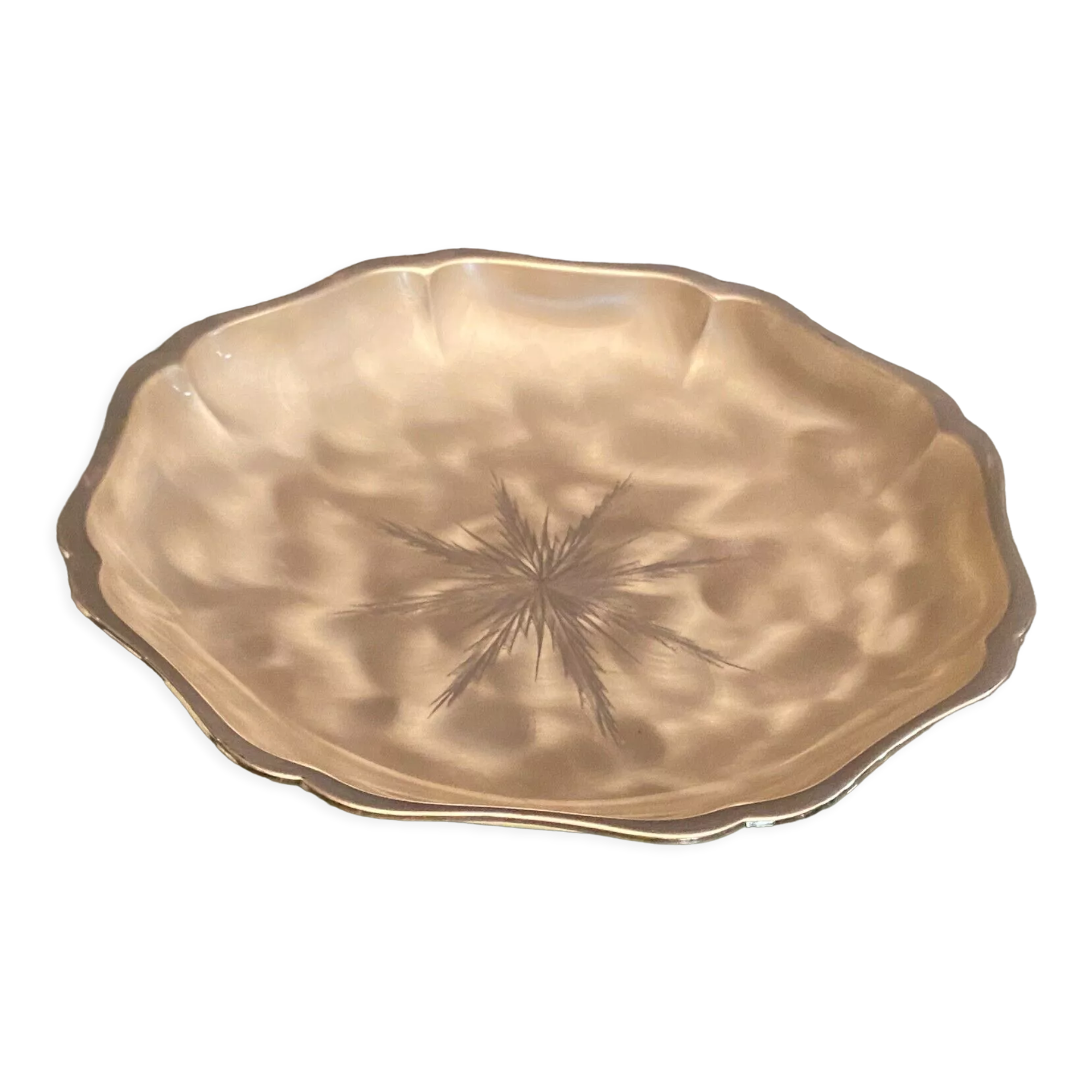 Metal dish with starry decoration