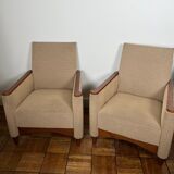 Pair of armchairs in carved wood and vintage fabric