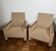 Pair of armchairs in carved wood and vintage fabric