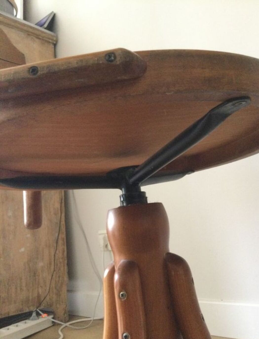 Swivel wooden armchair