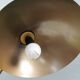 A wall lamp in black and brass-coloured finishes. Danish, early 2000s.