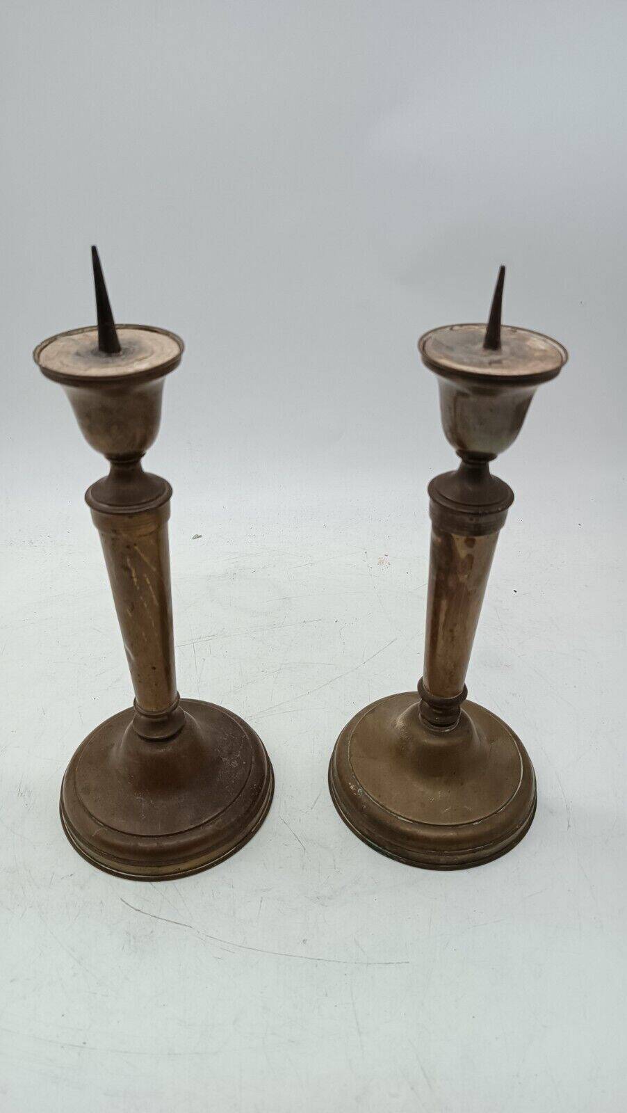 Pair of antique bronze candelabras