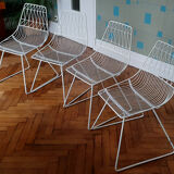 Design chairs in white metal