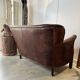 Banquette vintage en cuir clouté