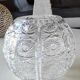 Vase shaped ball in carved Bohemian crystal. Star motifs, diamond braces, hardwoods. Diam 16 cm