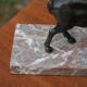 Vintage antelope gazelle bookend in patinated metal on a marble base.