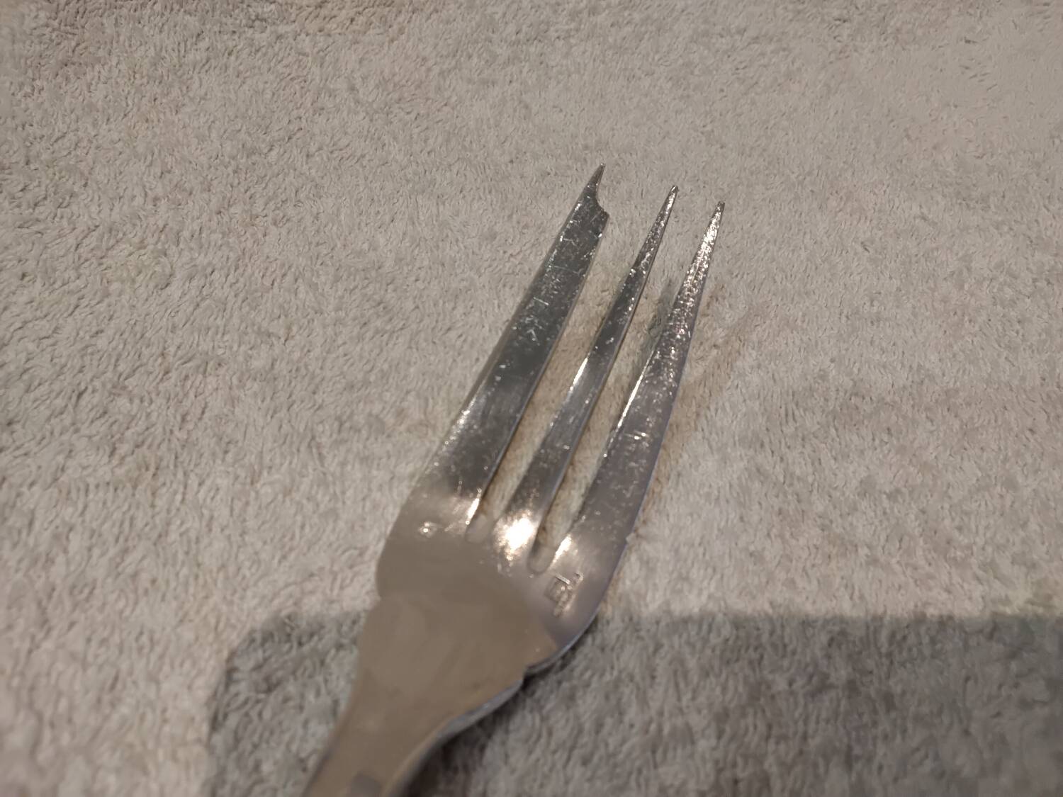 Silver-plated metal stew fork by Christofle silversmiths, Atlas model