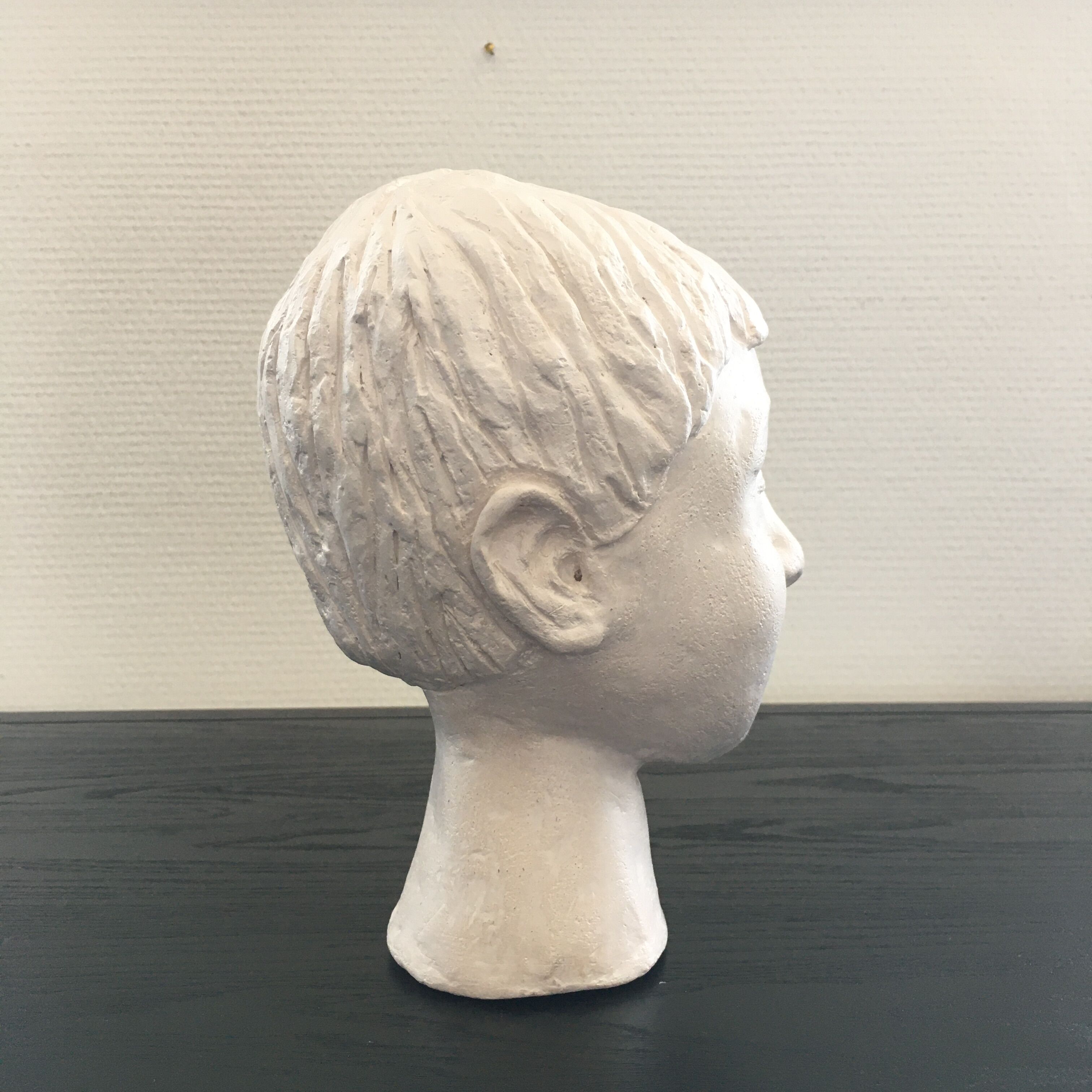 Plaster girl's head
