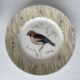 7 antique plates decorated with birds