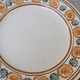 10 dessert plates Saint Amand Amandinoise frilled with orange and black flowers.