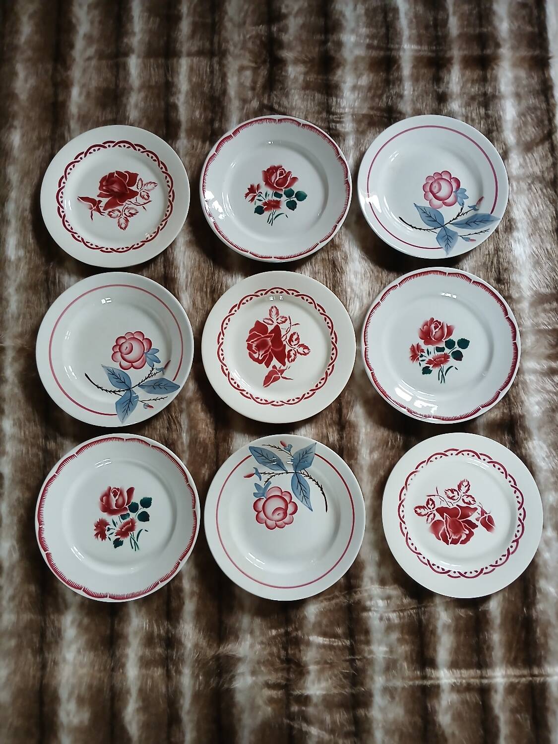 9 mismatched antique dinner plates