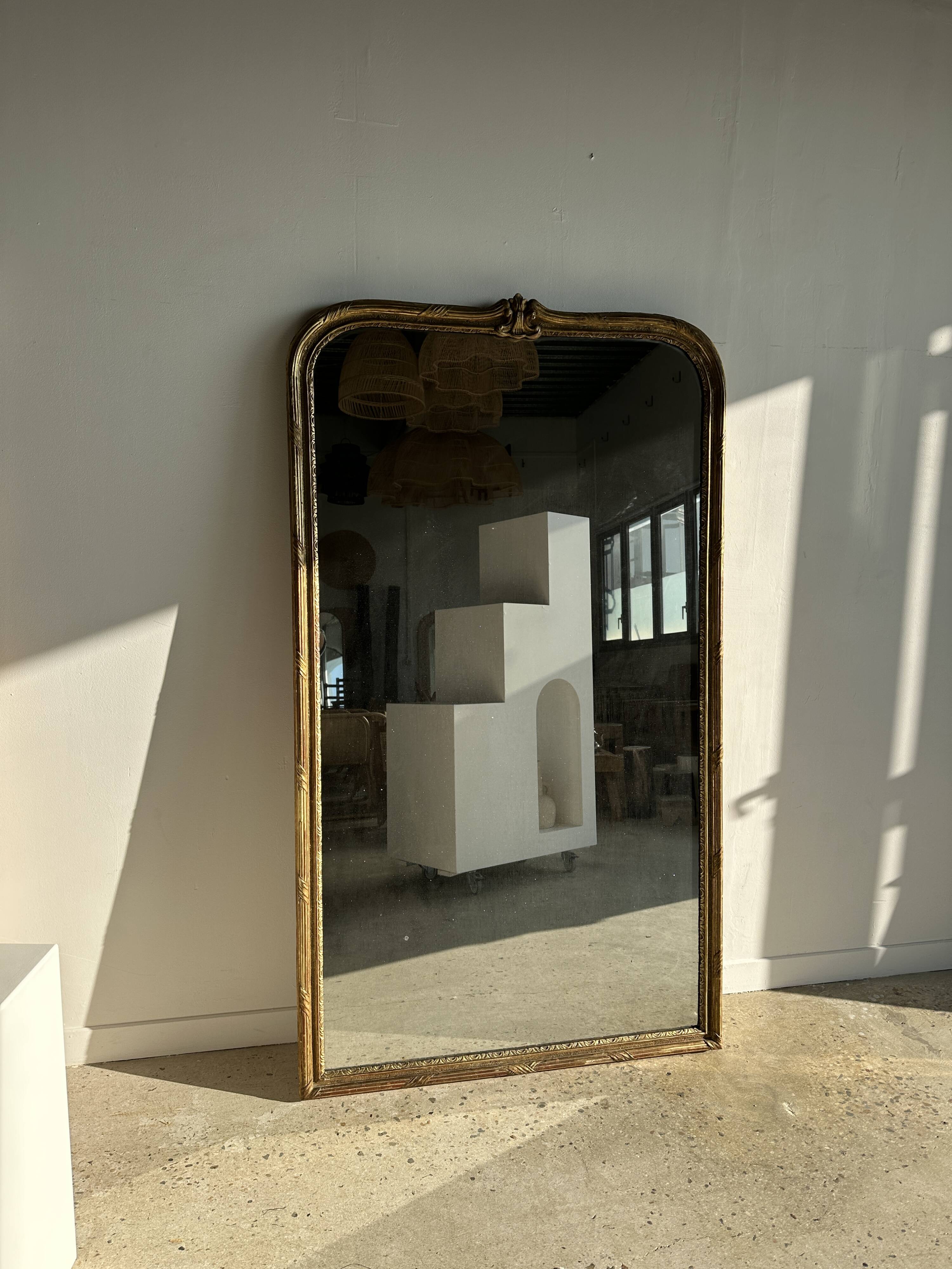 Large gilded mirror 19th century rounded corners mercury glass Louis XVI style