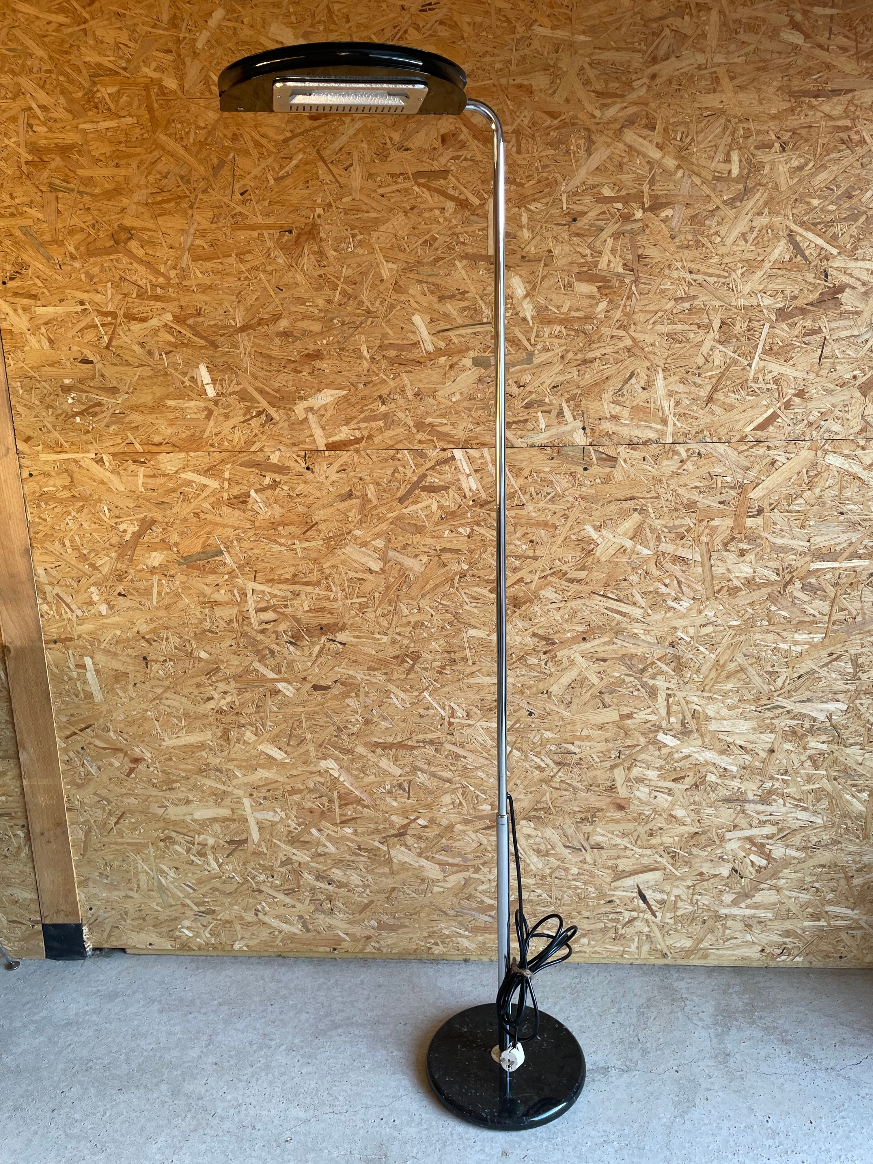 Mezzaluna floor lamp by Bruno Gecchelin for Skipper and Pollux 1974