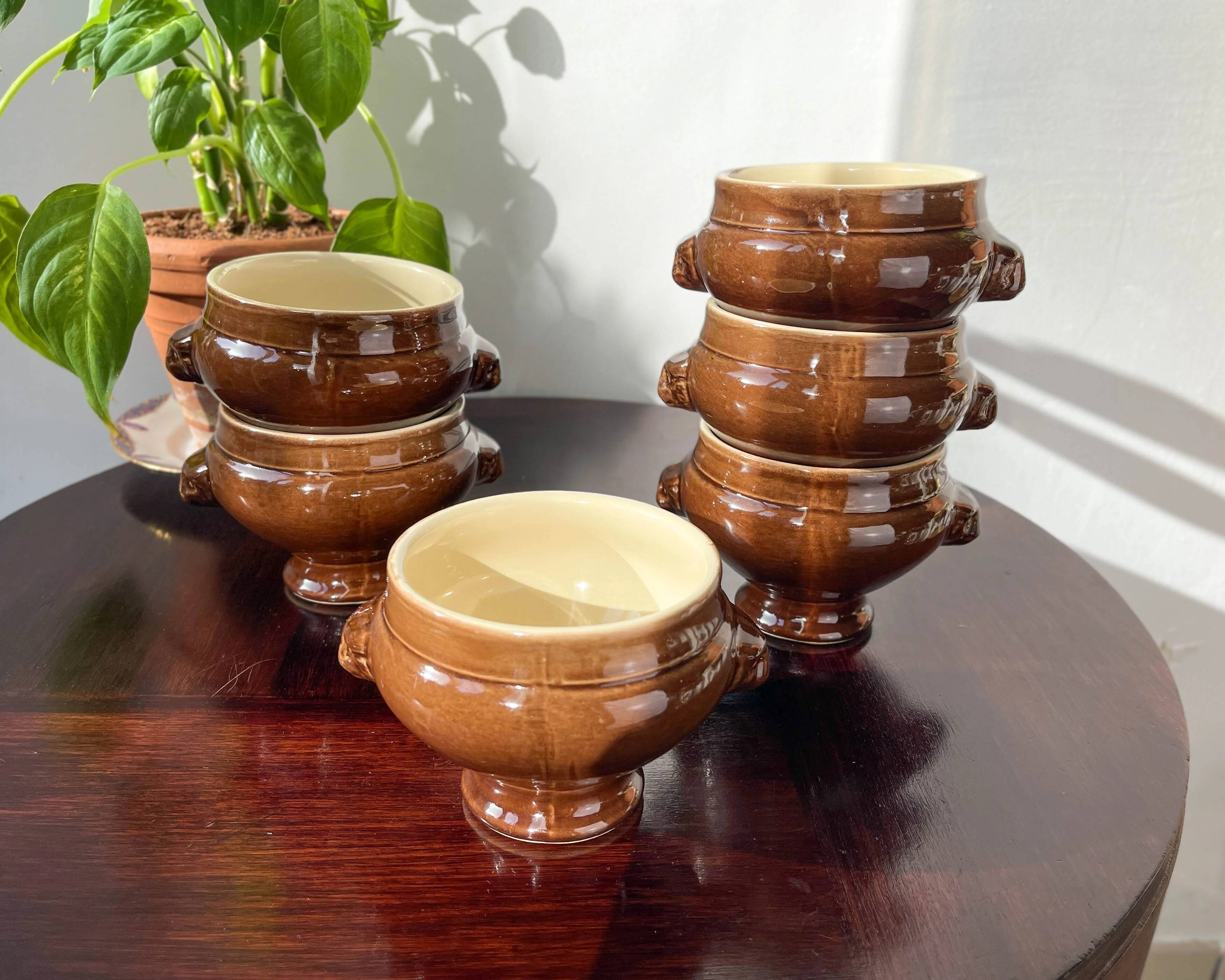 6 vintage Emile Henry lion's head onion soup bowls in ceramic - brown, made in France.