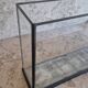 Showcase, antique table display in iron and glass