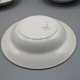 12 hollow porcelain plates, floral decoration and golden ledé - ∅: 23cm