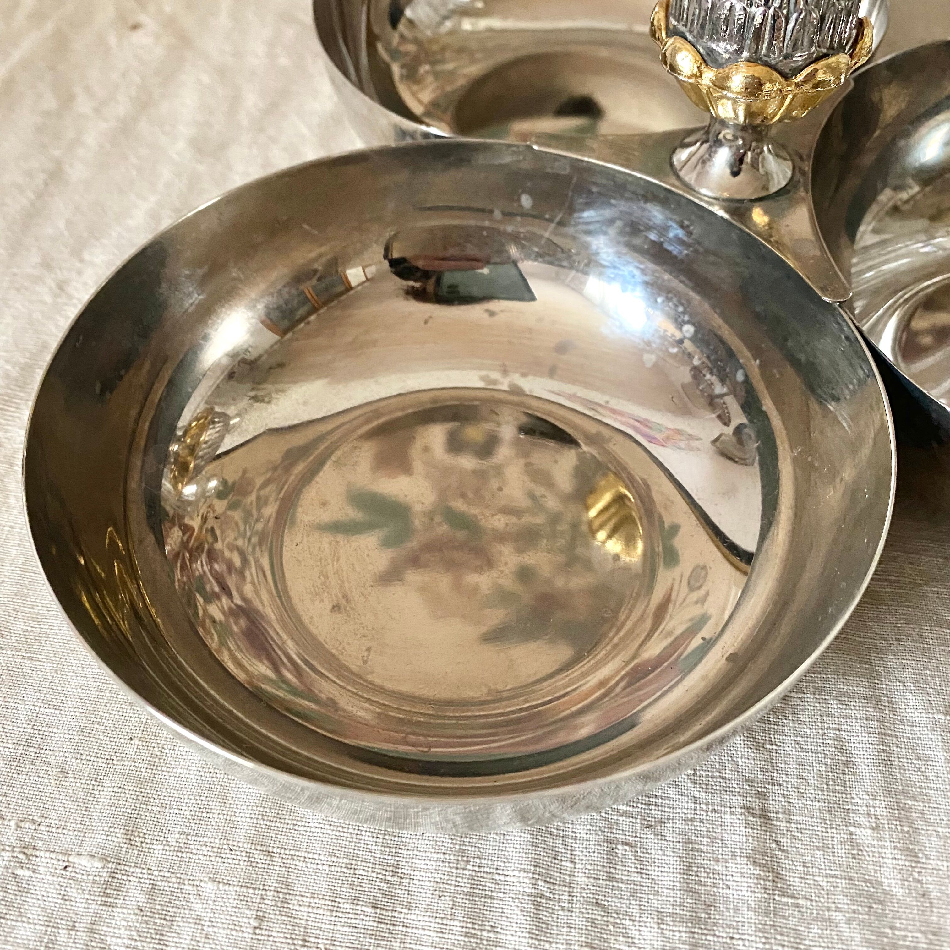 Servant in silver metal pine cone