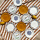Set of twelve mismatched vintage dessert plates.