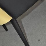 Pair of vintage 1950s cocktail chairs in yellow velvet and black faux leather, wooden frame.