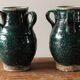 Set of two Chinese green glazed stoneware storage jars.