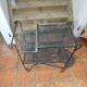 Perforated wrought iron rolling dessert trolley