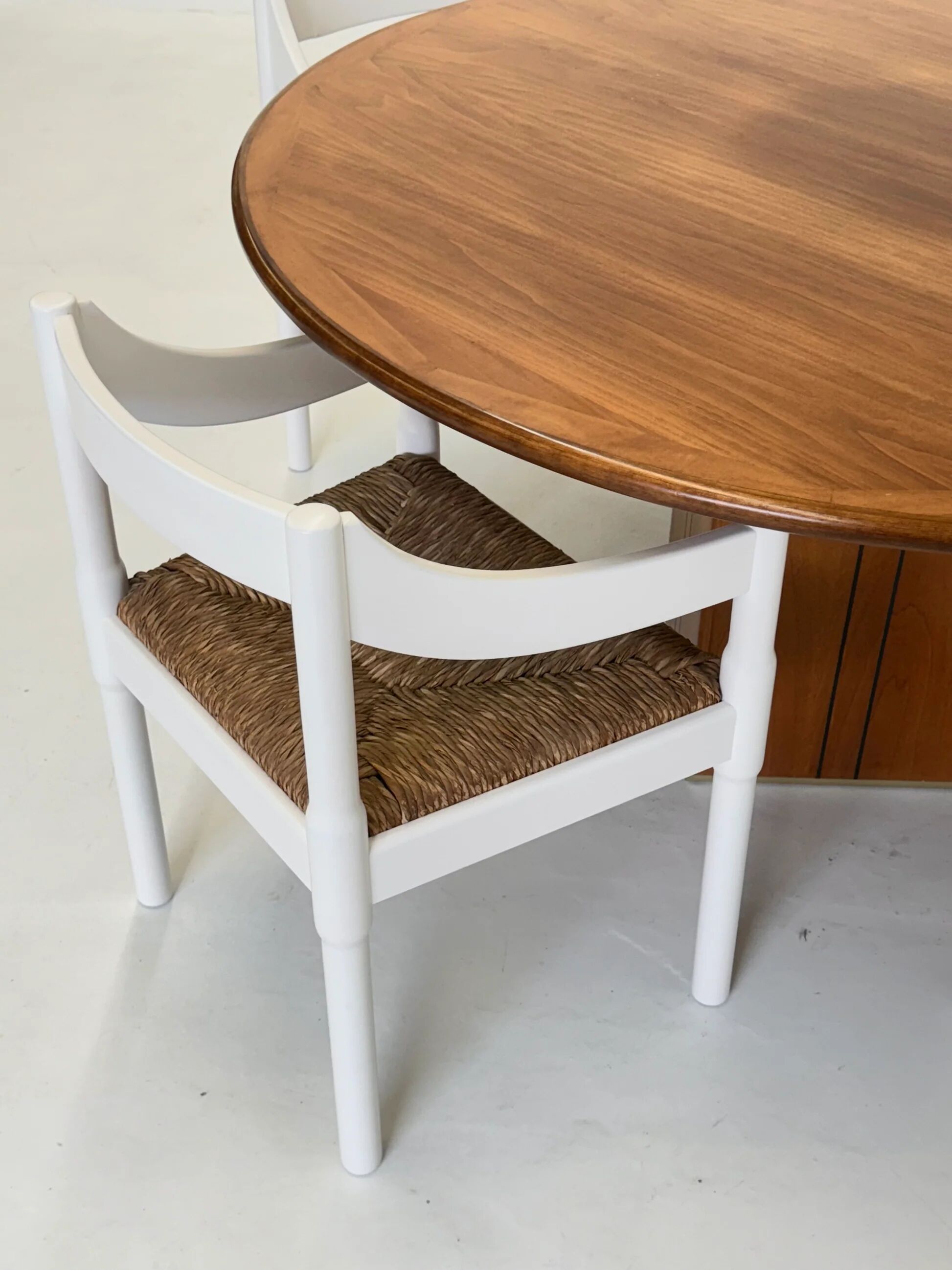 Set of two Carimate chairs by Vico Magistretti in white