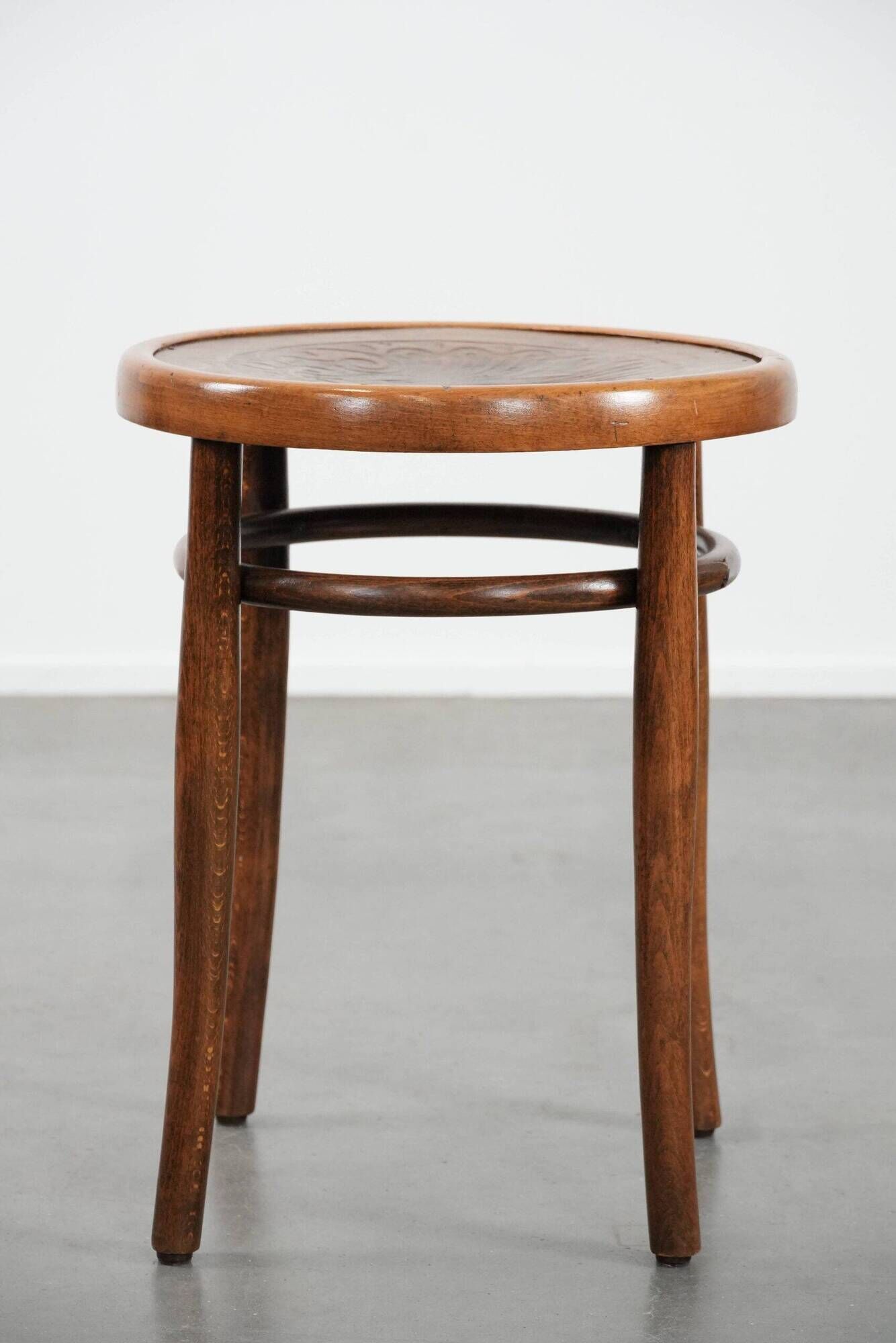 Antique bentwood stool from early 1900s with a seat with beautiful details