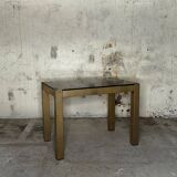 Trio of nesting tables, brass structures and smoked mirror tops