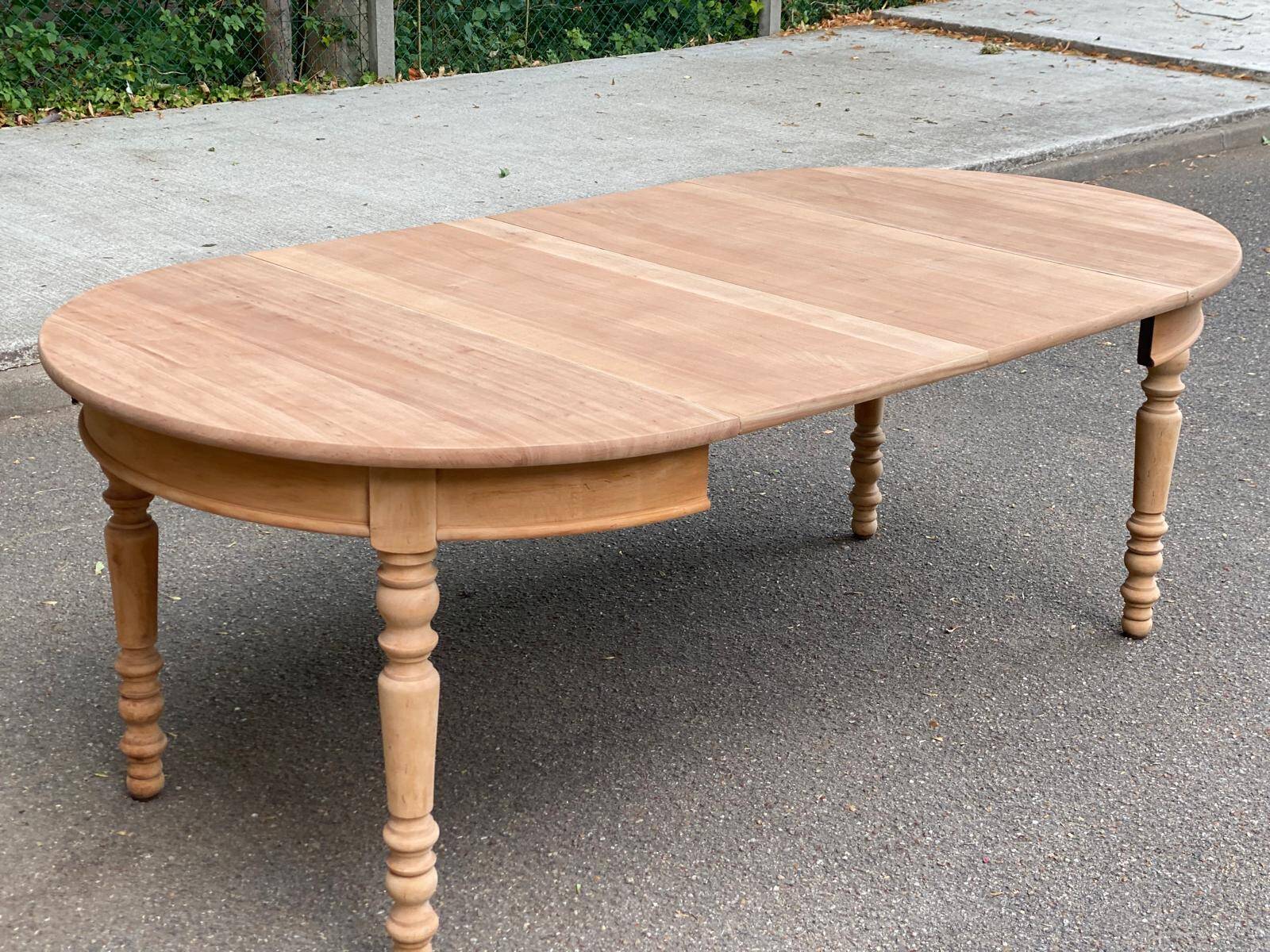 Round extendable dining table stripped in solid cherry wood France 1950