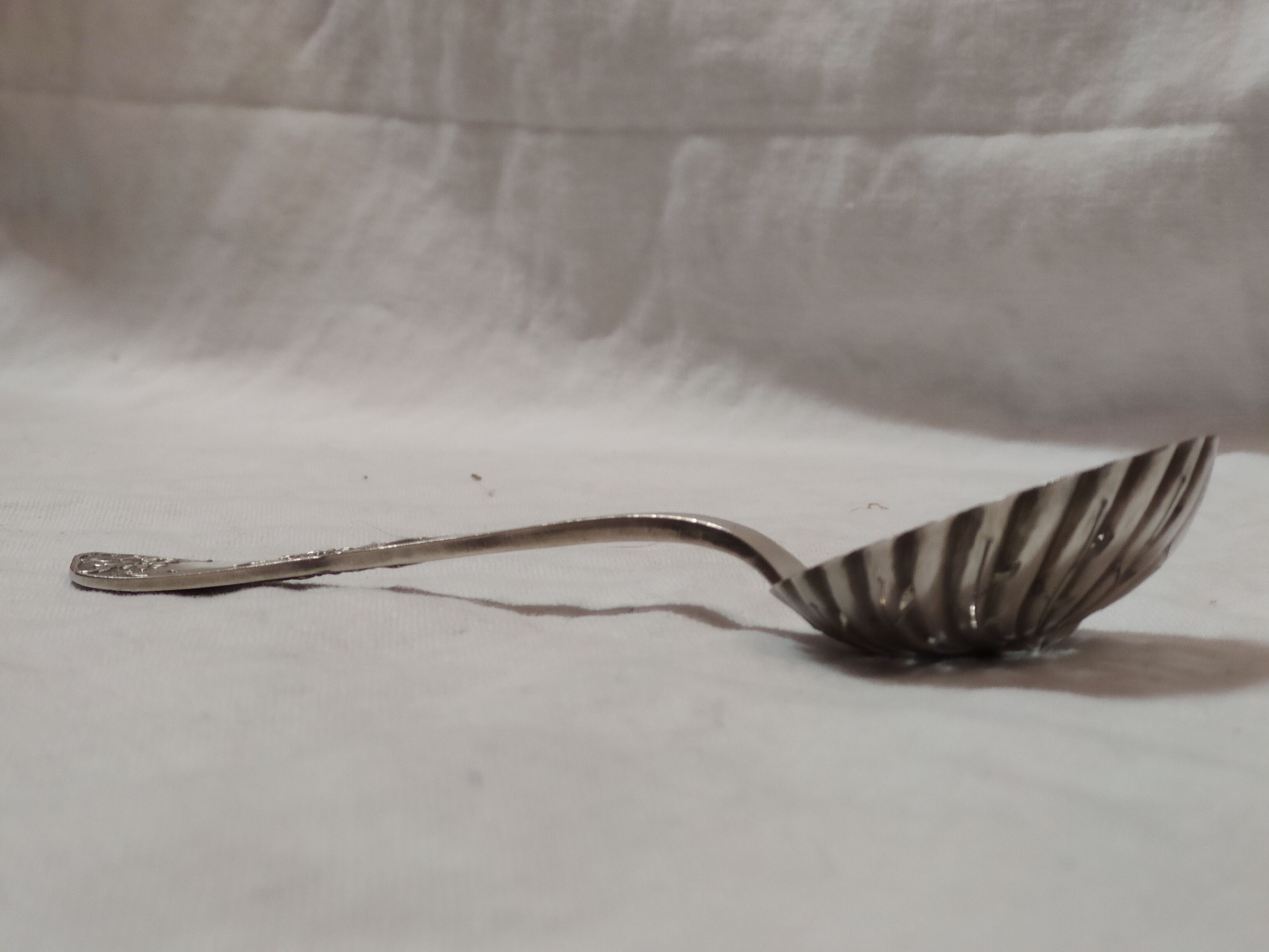 Sprinkled, silver metal.