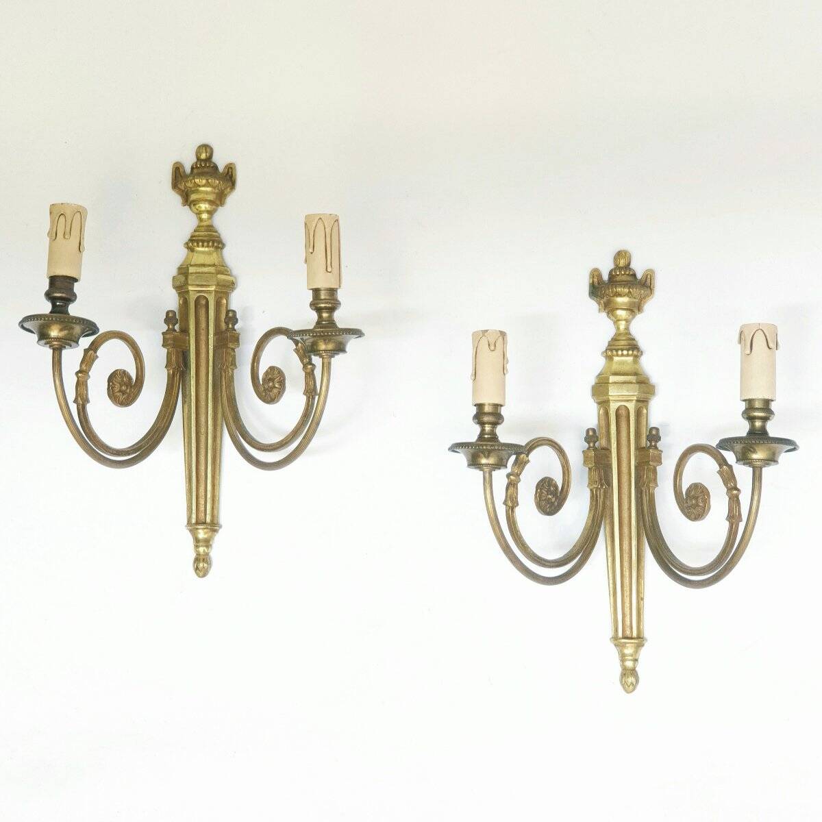 Pair of bronze wall sconces in Louis XVI style