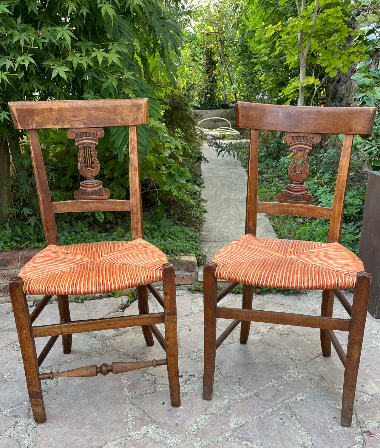 Pair of straw seated chairs