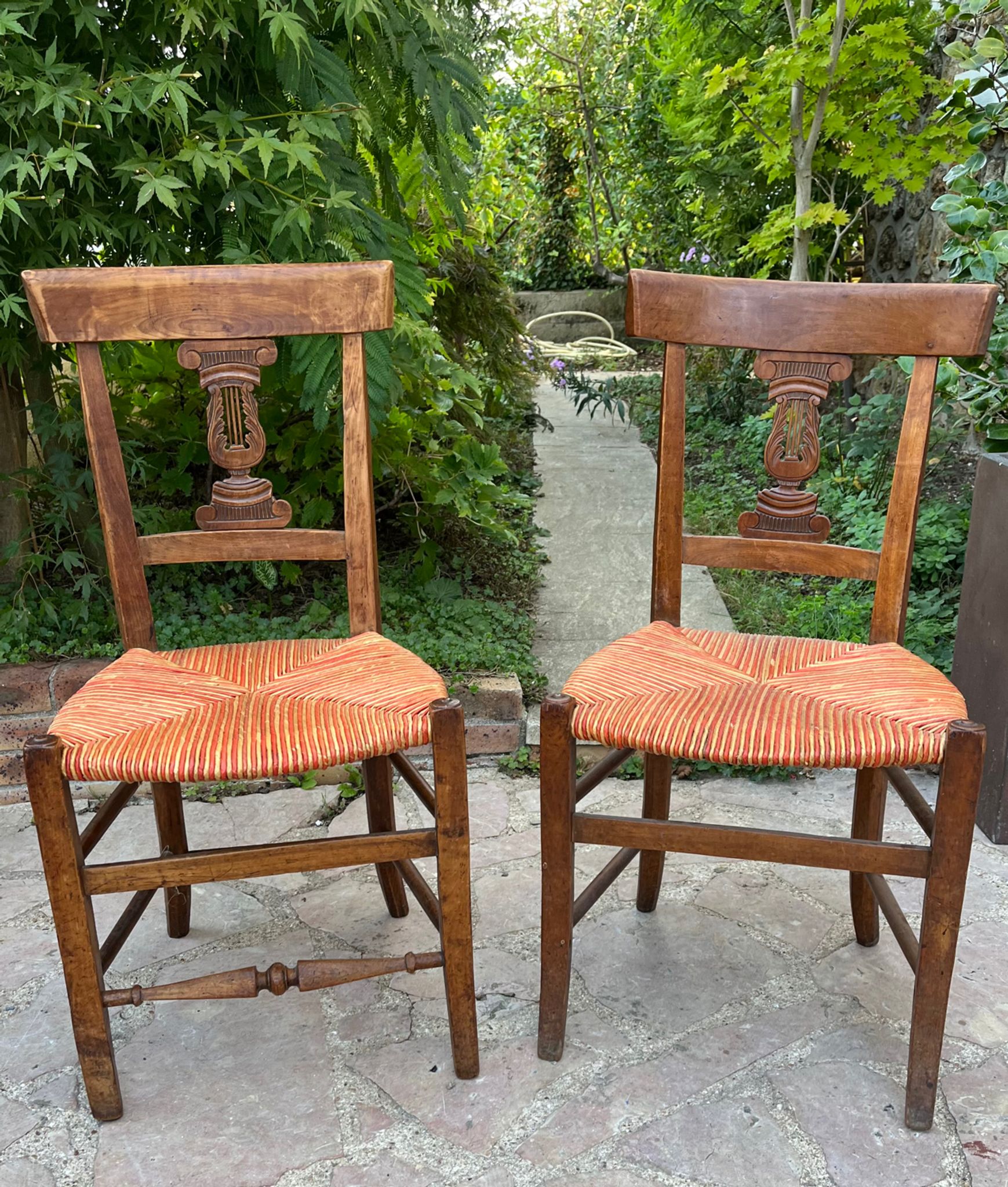 Pair of straw seated chairs