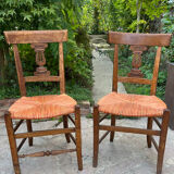 Pair of straw seated chairs