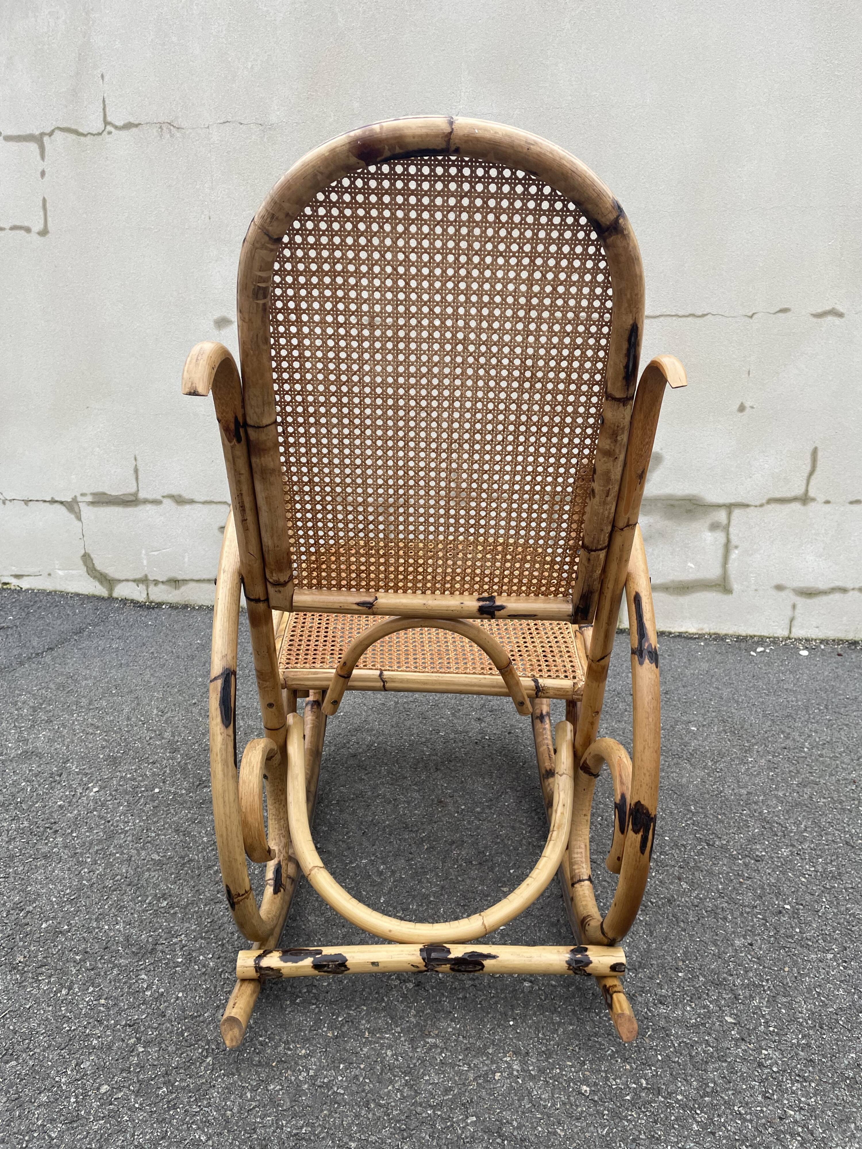 Rattan and cane rocking chair
