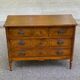 Commode Louis XVI en marqueterie et placage d'amarante/merisier 1950