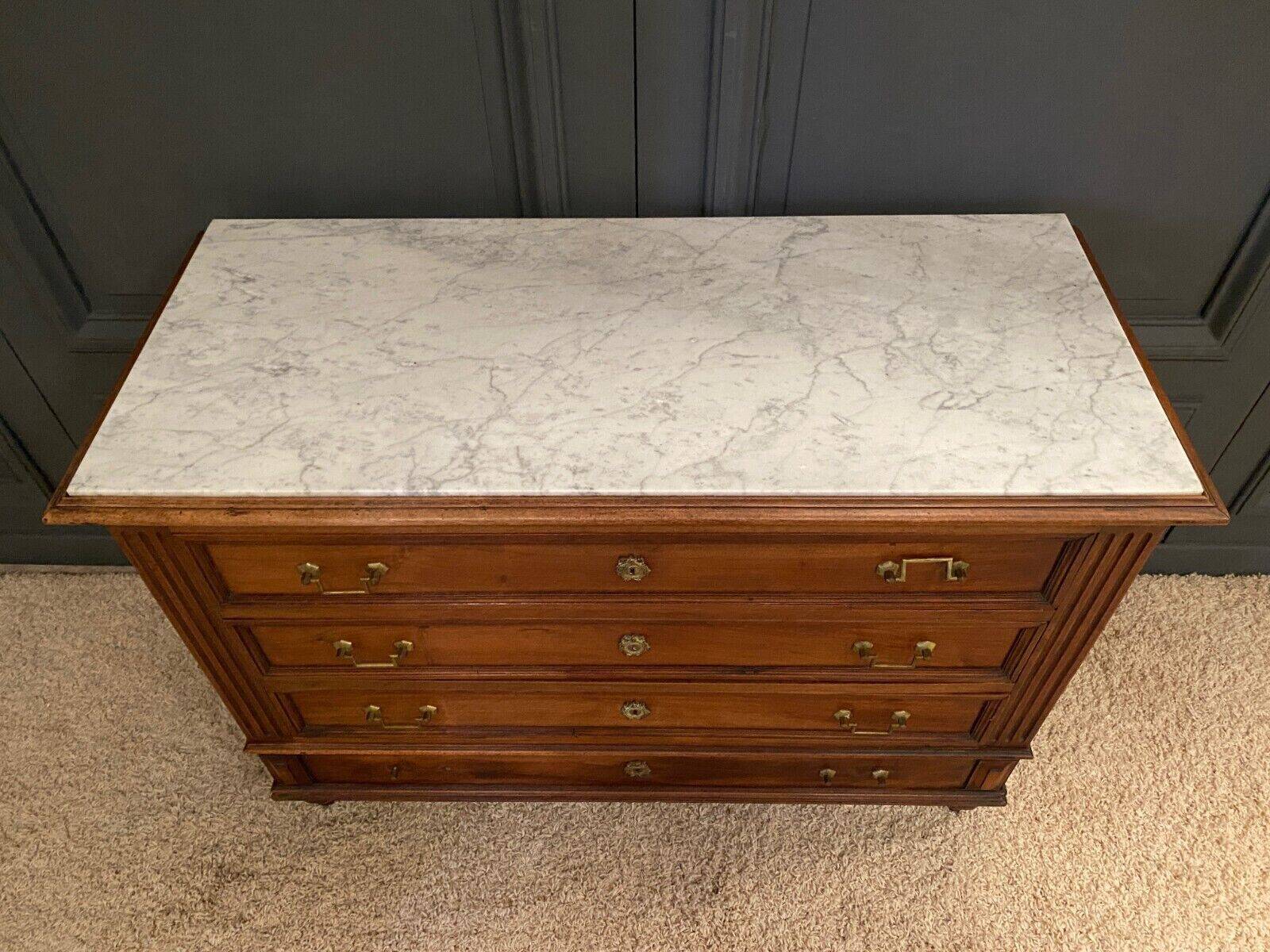 19th century Louis XVI style chest of drawers, white marble, fluted 4 drawers