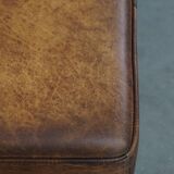 Hocker/coffee table made of sheepskin