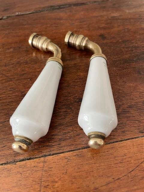 pair of Limoges porcelain handle levers UCDA and l