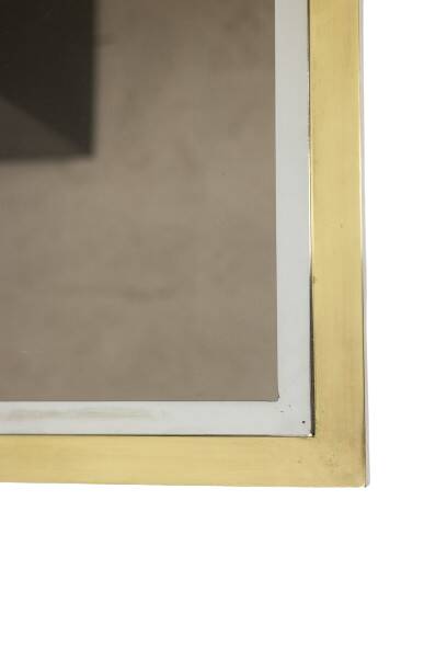 Coffee table in gilded brass and smoked glass. 1970s.