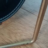 Modernist magazine rack in the style of Jacques Adnet